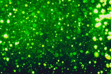 Siyah arkaplan ile soyut yeşil bokeh