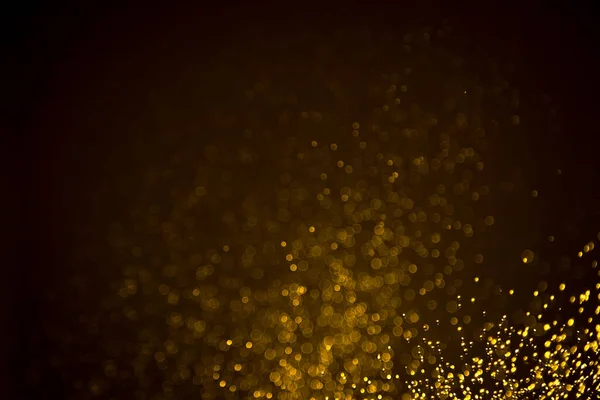 Dark Abstract Bokeh Ouro Brilho Sobre Fundo Preto — Fotografia de Stock