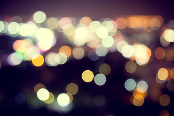 Blur defocus bokeh of light in the city with dark background
