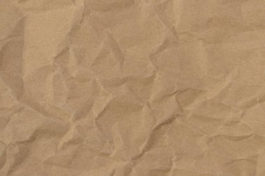 Kırışıklık arkaplanı olan kahverengi kağıt