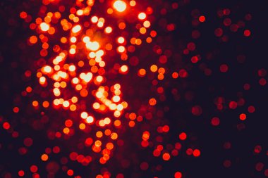 Siyah arkaplanlı Bokeh kırmızısı
