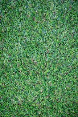 Yeşil yapay çim zemin arka planı