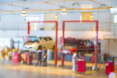 Blur Cars to repair and check the distance at the service center with bokeh background