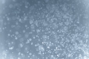 Mavi arkaplan ile soyut beyaz bokeh