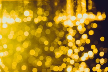 Siyah arkaplan ile soyut altın bokeh