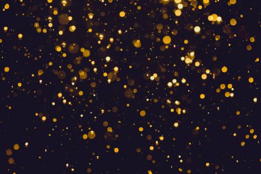 Siyah arkaplan ile soyut altın bokeh