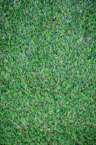 Yeşil yapay çim zemin arka planı