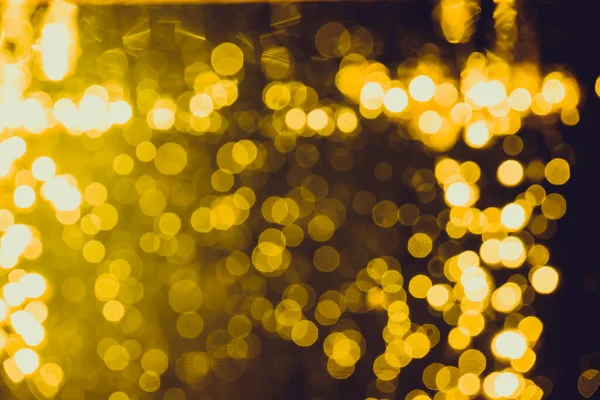 Siyah arkaplan ile soyut altın bokeh