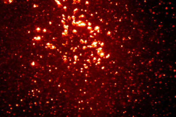 Siyah Arkaplanda Kırmızı Parıltılı Klasik Işıklar — Stok fotoğraf