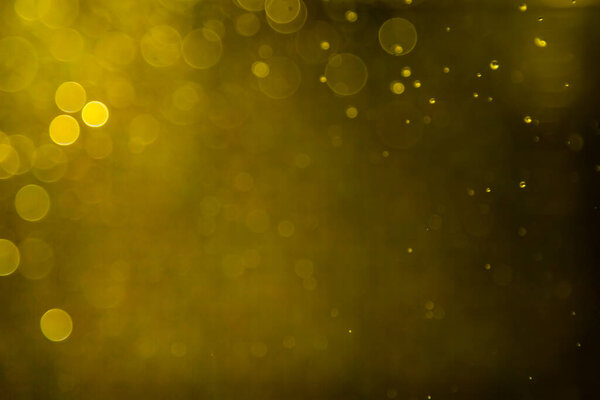 Gold bokeh water with light background