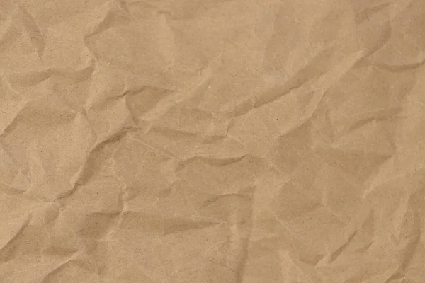 Brown paper with wrinkles texture background