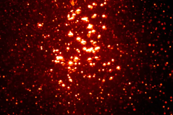 Siyah Arkaplanda Kırmızı Parıltılı Klasik Işıklar — Stok fotoğraf