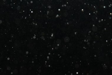 Kutlama arka planı için Bokeh 'in ışıldayan yıldızları