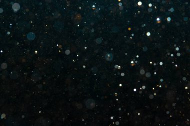 Kutlama arka planı için Bokeh 'in ışıldayan yıldızları