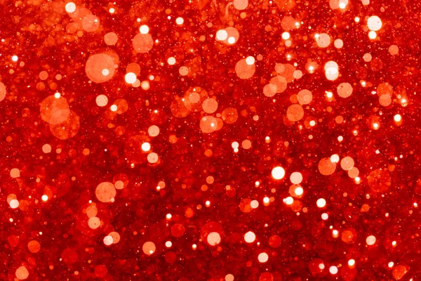 Rotes Bokeh Aus Leicht Strukturiertem Glitzerhintergrund — Stockfoto