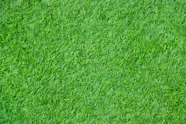 Green artificial grass natural background