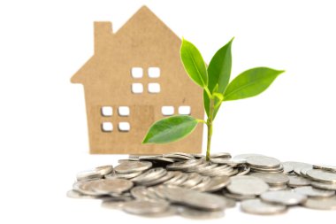 Saving money for the purchase of accommodation Concept on a white background