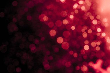 Soyut dekorasyon Bokeh bayramında siyah arka planda parlayan ışıklar