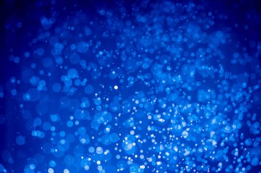Soyut koyu mavi noel sim ışıkları bokeh arkaplanının odak noktasını kaldırdı