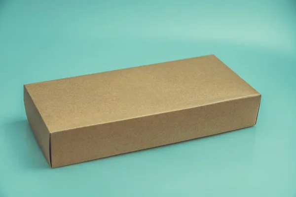 Caja Cartón Vacía Aislada Sobre Fondo Verde —  Fotos de Stock