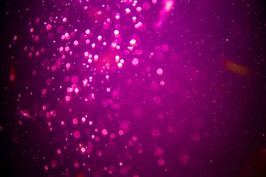 Abstract pink defocus bokeh glitter  with black background