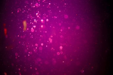 Abstract pink defocus bokeh glitter  with black background