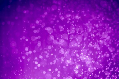 Soyut menekşe mor parıltılı ışıklar Odaklanmış bokeh arkaplanı