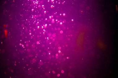 Abstract pink defocus bokeh glitter  with black background