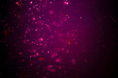 Abstract pink defocus bokeh glitter  with black background