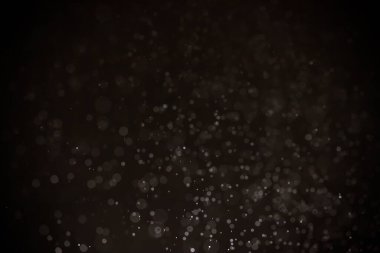 Siyah arkaplanı olan soyut siyah bokeh