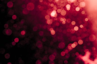 Soyut dekorasyon Bokeh bayramında siyah arka planda parlayan ışıklar