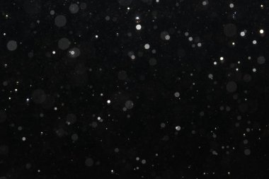 Kutlama arka planı için Bokeh 'in ışıldayan yıldızları