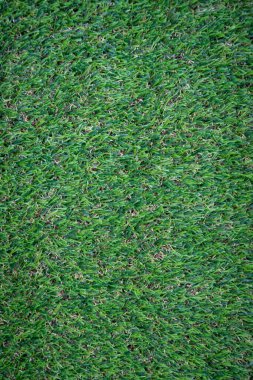 Yeşil yapay çim zemin arka planı