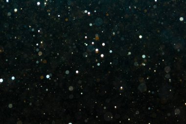 Kutlama arka planı için Bokeh 'in ışıldayan yıldızları