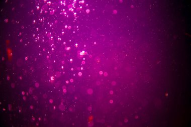 Abstract pink defocus bokeh glitter  with black background