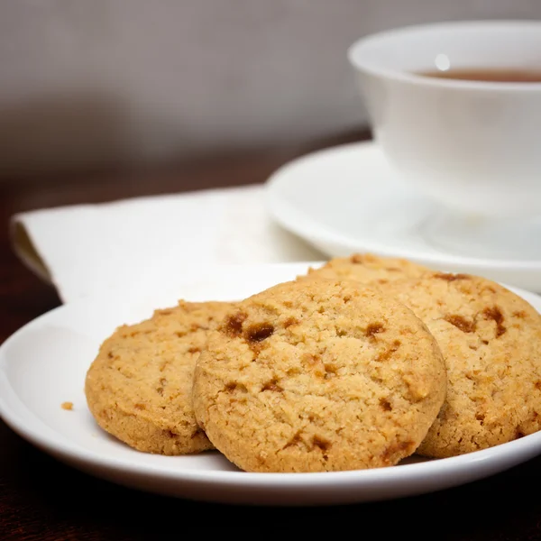 Theetijd met cookies — Stockfoto