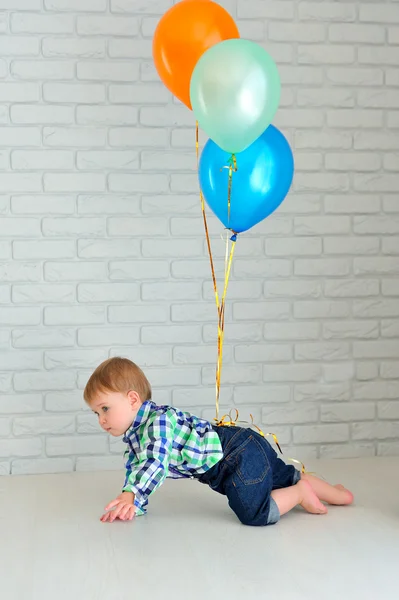 Boy with colorful balloons — Stock Photo, Image