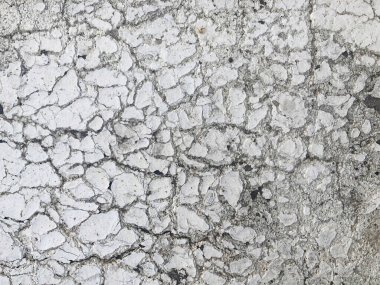 Çatlak zemin dokusu. Kurak mevsimde toprak yarıldı. Kuraklıkta toprak, toprak dokusu ve kuru çamur, kuru toprak..