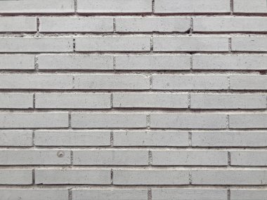 Görüntü ve grafikler için soyut tuğla duvar dokusu veya arkaplan. Gürültülü, kumlu ve posterli tuğla duvar eski ve eski moda bir desenle dokuyu kapat. 