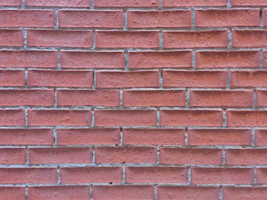 Görüntü ve grafikler için soyut tuğla duvar dokusu veya arkaplan. Gürültülü, kumlu ve posterli tuğla duvar eski ve eski moda bir desenle dokuyu kapat. 