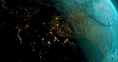 Uzaydan gelen dünya gezegeni. Yörünge uydusundan Dünya 'nın güzel görüntüsü. Toprağın gündüz ve gece ışıkları. Dünya gezegeni dönen animasyon. uzay, gezegen, galaksi, yıldızlar, evren, deniz, toprak, günbatımı, dünya.