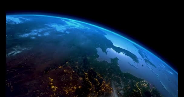 宇宙からの惑星地球 昼も夜も大地の光 惑星地球回転アニメーション 軌道衛星から見た地球の美しい眺め — ストック動画
