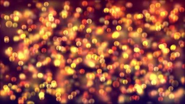 Yellow color Delightful soft light bokeh and particles visuals with shallow depth of field. Abstract background with animation of flying and flickering particles as bokeh of light.