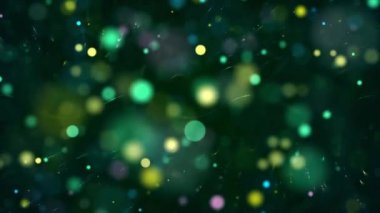 Green color Delightful soft light bokeh and particles visuals with shallow depth of field. Abstract background with animation of flying and flickering particles as bokeh of light.
