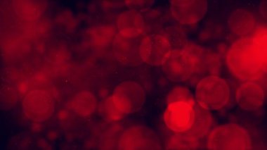 Kırmızı renk hoş yumuşak ışık bokeh ve parçacıklar yüzeysel alan derinliğinde görseller. Uçan ve titreyen parçacıkların ışık demeti olarak canlandırılmış soyut arkaplan.
