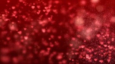 Heart particle animated background video. Red love hearts bokeh sparkle glitter particle motion Loop background. Festive of bokeh, sparkles, hearts for Valentine's day, birthday.