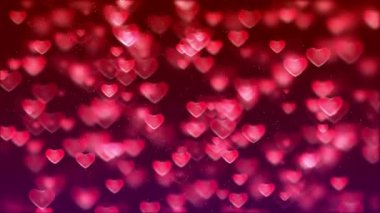 Heart particle animated background video. Red love hearts bokeh sparkle glitter particle motion Loop background. Festive of bokeh, sparkles, hearts for Valentine's day, birthday.