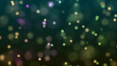 Green color Delightful soft light bokeh and particles visuals with shallow depth of field. Abstract background with animation of flying and flickering particles as bokeh of light.