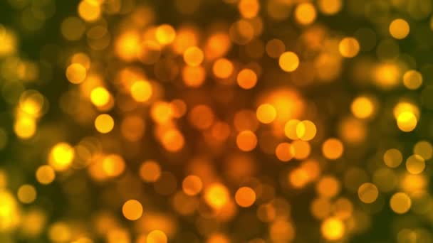 黄金の色フィールドの浅い深さで楽しい柔らかい光のボケと粒子のビジュアル 光のボケとしての空飛ぶ粒子とちらつき粒子のアニメーションを用いた抽象的な背景 — ストック動画