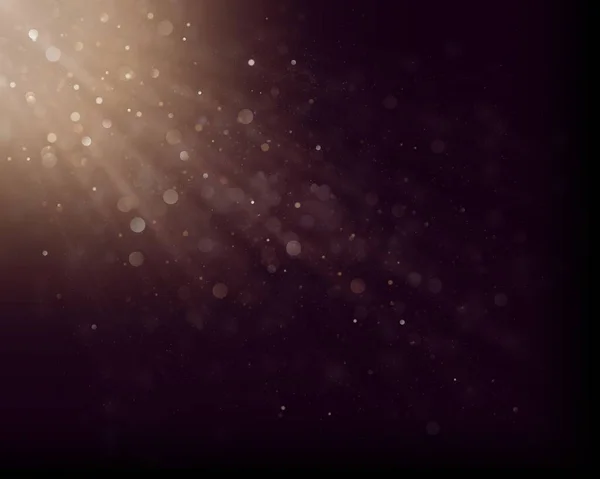 Defocused soft light and bokeh glitter lights background. Golden shimmering particles abstract bokeh glitter background. Abstract dust bokeh background.